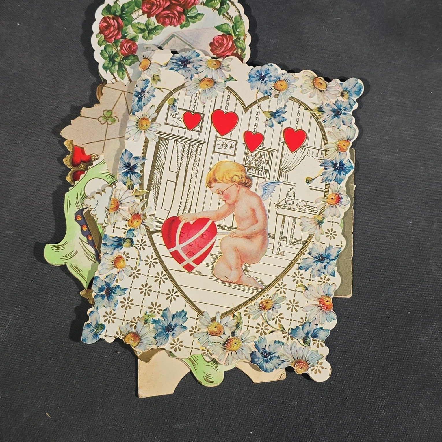 Grouping of 25+ Antique and Vintage Valentines, Postcards, Trade Cards, and Die-Cut Ephemera including Mechanical Chalkboard Valentine, Peck & Parker Owls Trade Card, and Essex County Club Manchester, Massachusetts Postcard