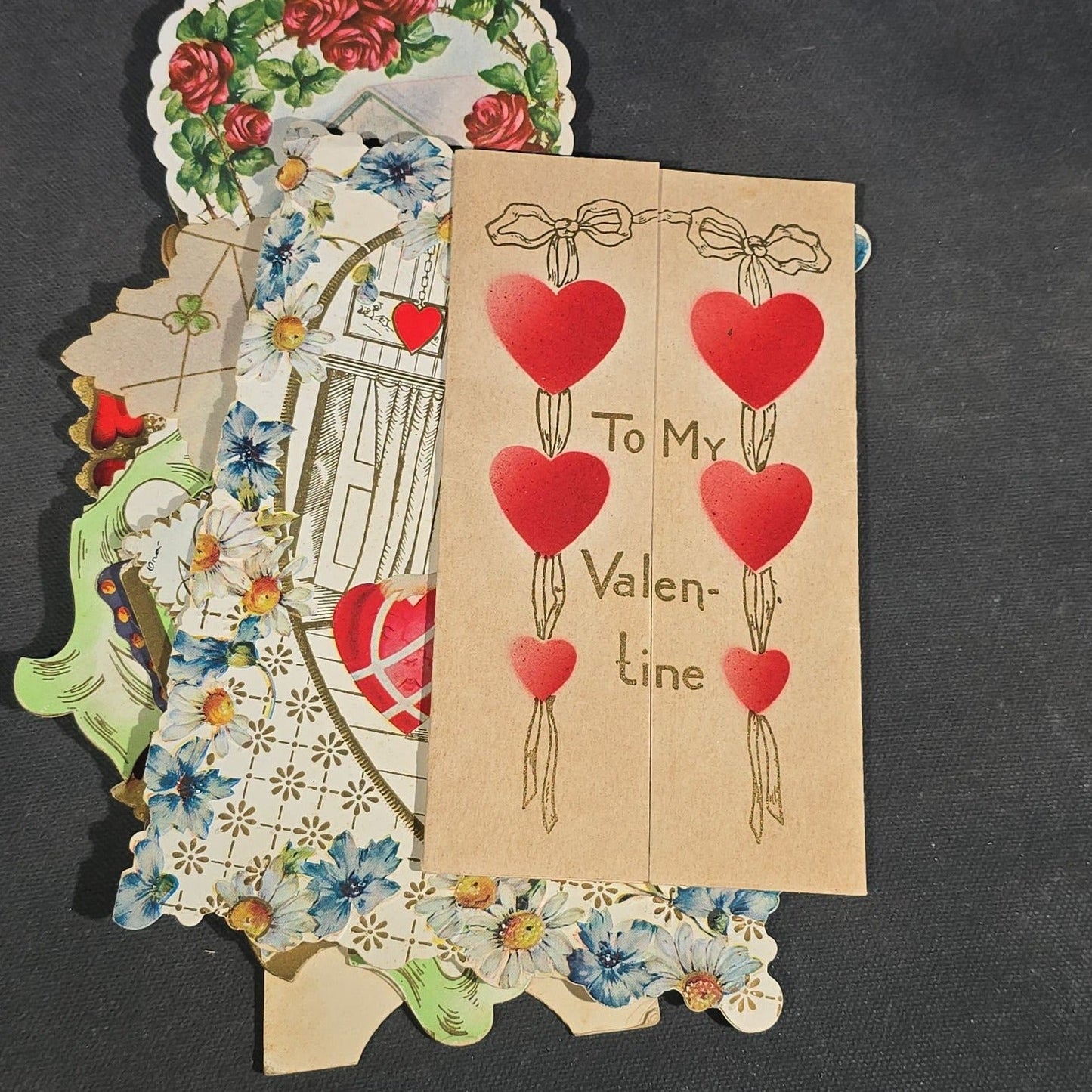 Grouping of 25+ Antique and Vintage Valentines, Postcards, Trade Cards, and Die-Cut Ephemera including Mechanical Chalkboard Valentine, Peck & Parker Owls Trade Card, and Essex County Club Manchester, Massachusetts Postcard