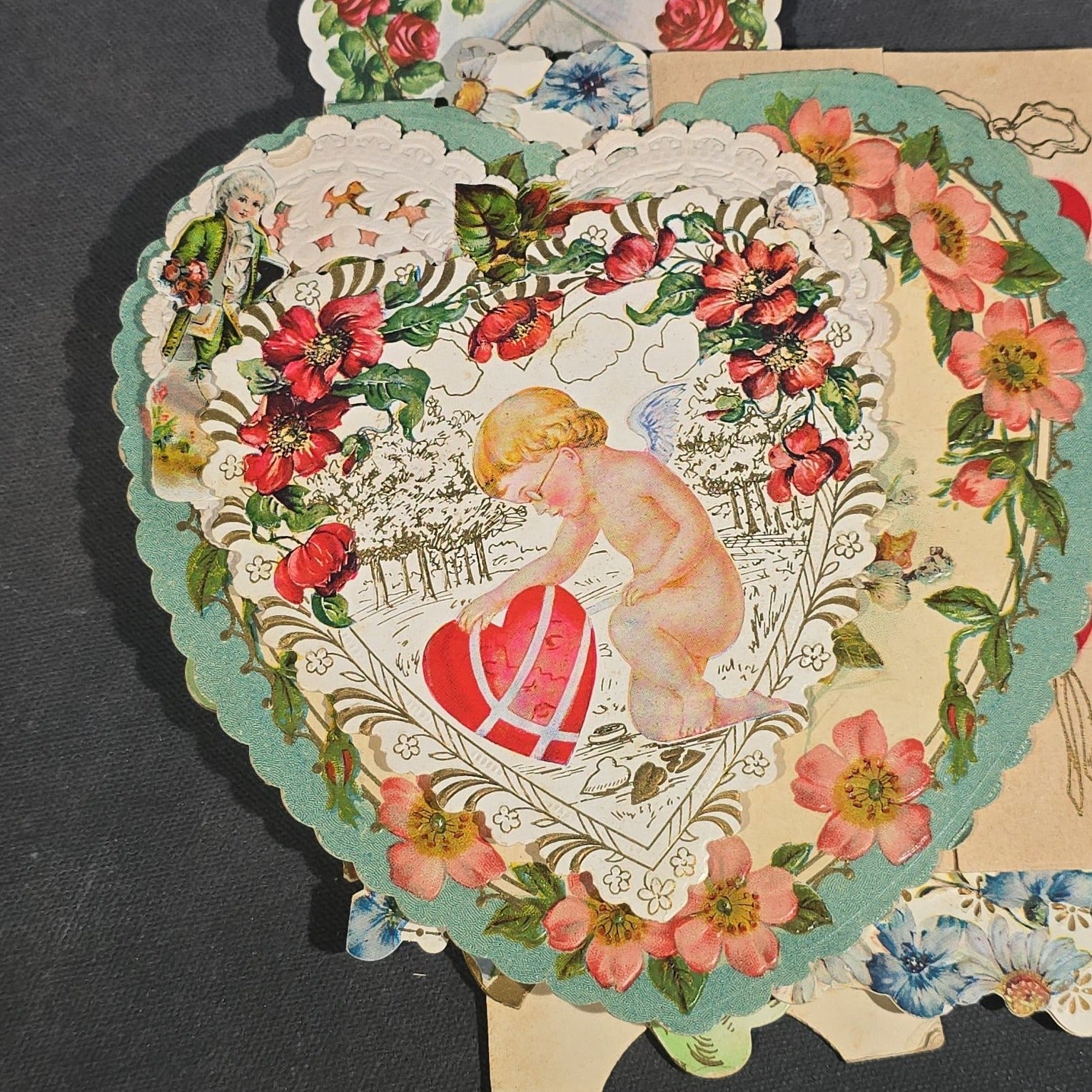 Grouping of 25+ Antique and Vintage Valentines, Postcards, Trade Cards, and Die-Cut Ephemera including Mechanical Chalkboard Valentine, Peck & Parker Owls Trade Card, and Essex County Club Manchester, Massachusetts Postcard