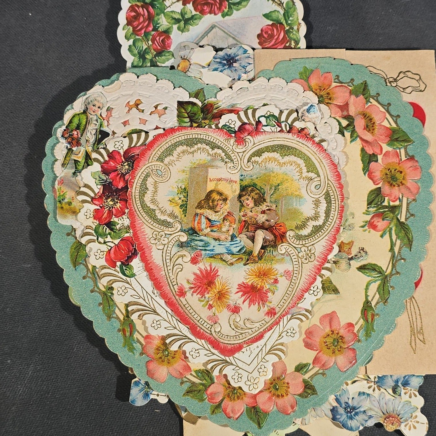 Grouping of 25+ Antique and Vintage Valentines, Postcards, Trade Cards, and Die-Cut Ephemera including Mechanical Chalkboard Valentine, Peck & Parker Owls Trade Card, and Essex County Club Manchester, Massachusetts Postcard