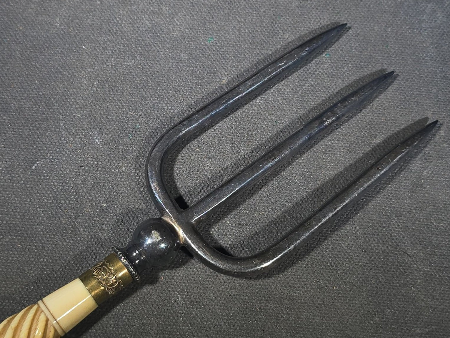 Antique Four-Tine Bread Fork with Carved Bone Handle and Brass Ferrules
