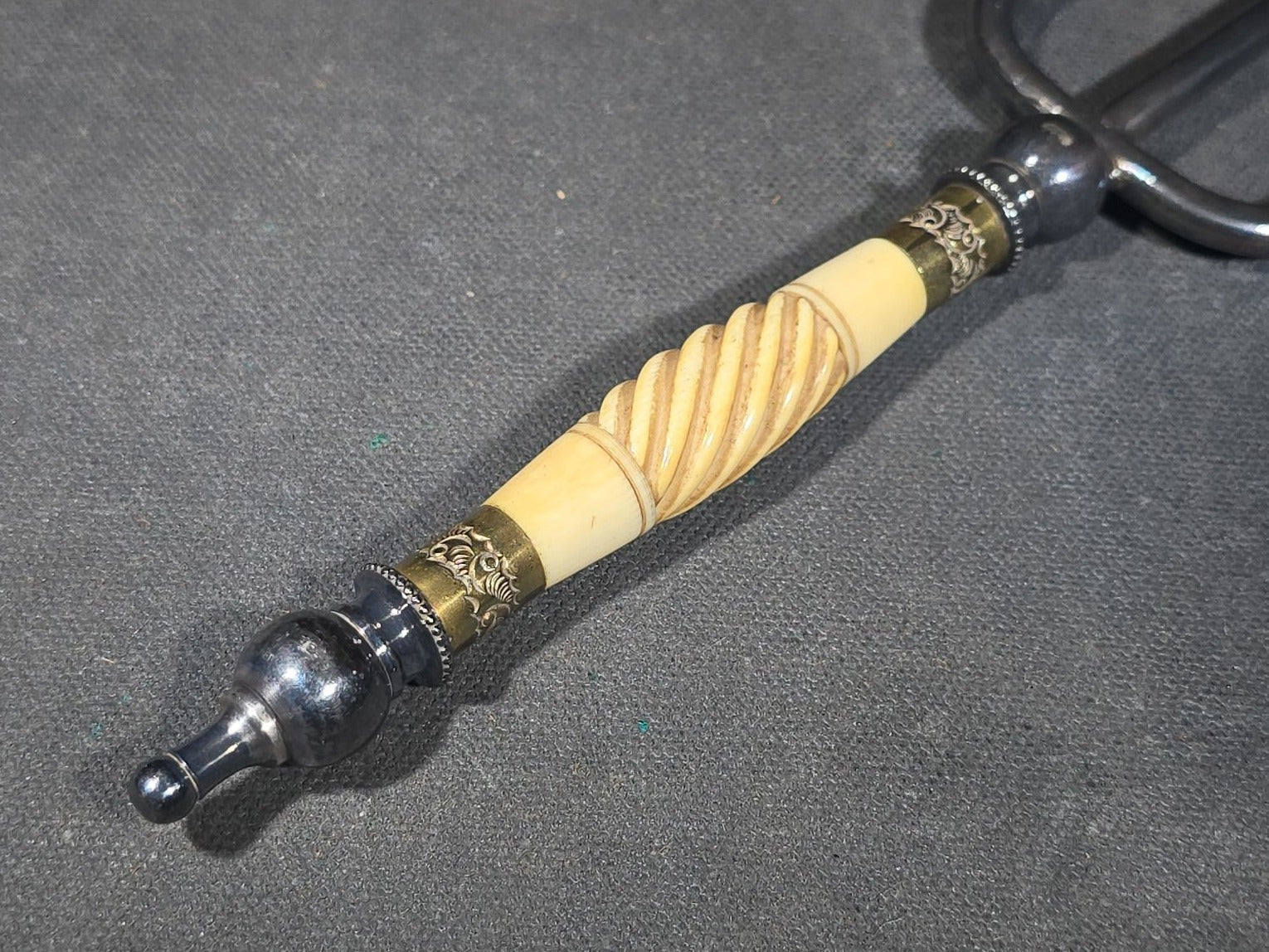 Antique Four-Tine Bread Fork with Carved Bone Handle and Brass Ferrules