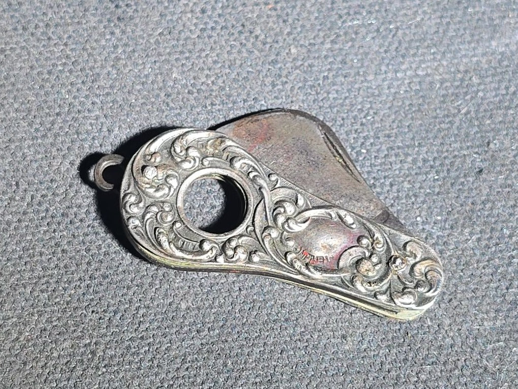 Antique Sterling Silver Cigar Cutter with Repousse Scroll Decoration