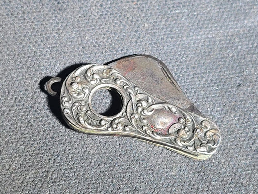 Antique Sterling Silver Cigar Cutter with Repousse Scroll Decoration