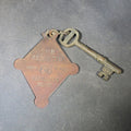 Lot 115 - Antique Hotel Room Key and Fob from the Atlantic, Nantasket Beach, Massachusetts, Room 66, Manufactured by John Robbins, Boston, Massachusetts