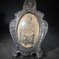 Lot 120 - Antique Commemorative Souvenir Picture Frame Marked "Kansas City 1910" With Oval Convex Glass and Photograph of a Seated Child, Owl and Serpent Motif