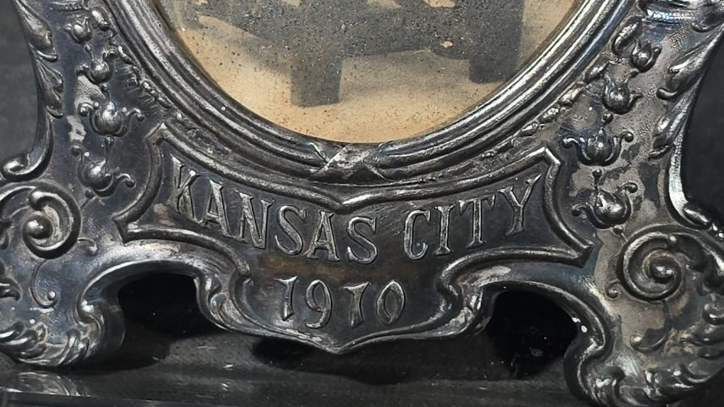Antique Commemorative Souvenir Picture Frame Marked "Kansas City 1910" with Oval Convex Glass and Photograph of a Seated Child, Owl and Serpent Motif