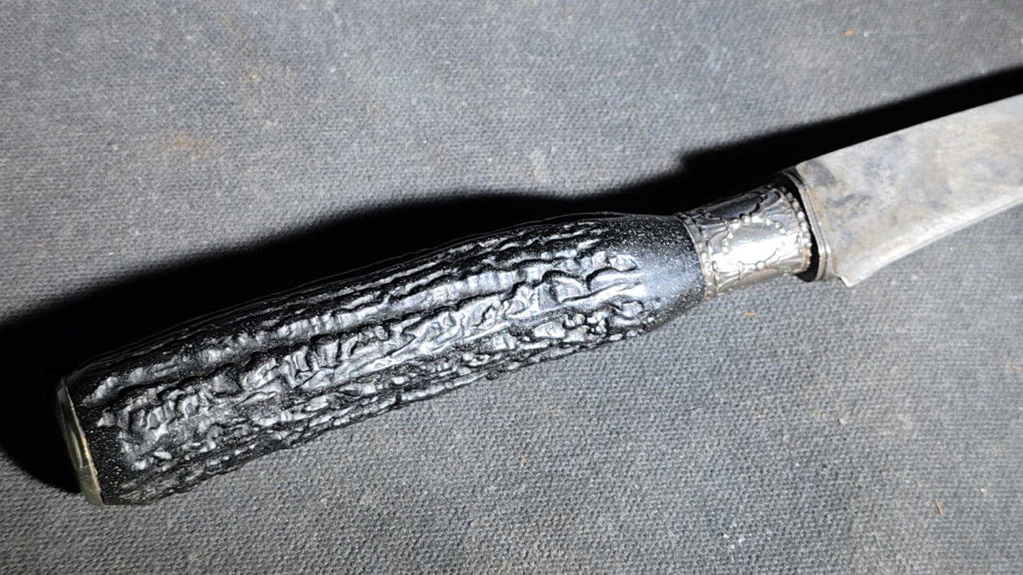 Grouping of Four Antique Carving Pieces including Trans-Mississippi Exposition Omaha 1898 Souvenir Knife, Stag-Handle Carving Knife and Fork, and Wood-Handle Carving Fork