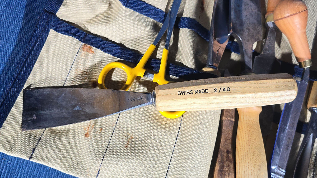Grouping of 15 Antique, Vintage, and Modern Woodworking Chisels and Gouges including Pfeil Swiss-Made Carving Tools in Canvas Tool Roll