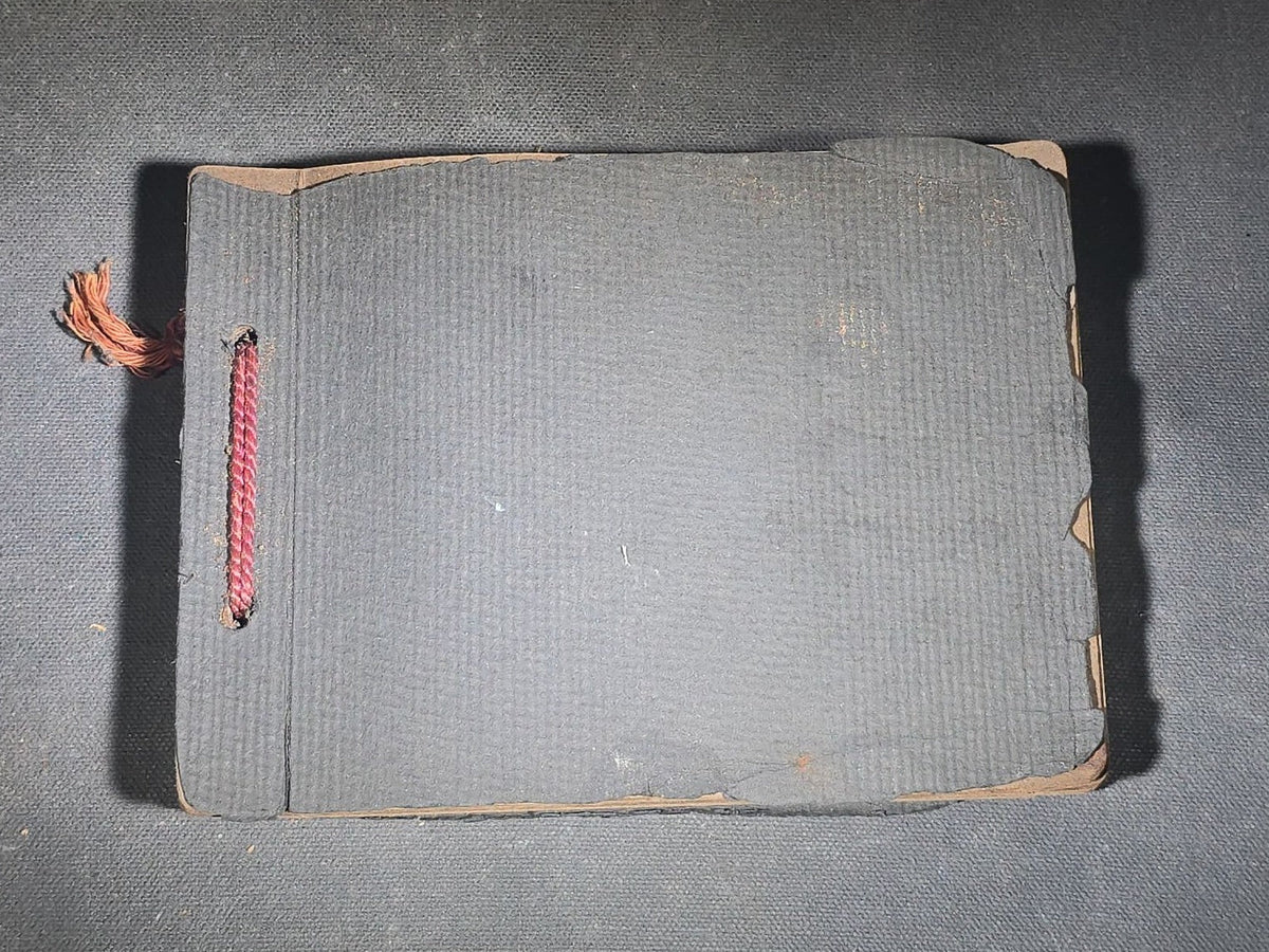 Antique Snapshot Photo Album Containing 45+ Snapshot Photographs, German-Captioned Transatlantic Voyage Aboard the R.M.S. Majestic with New York City Street Scenes, Shipboard Costume Party, Dining Room Interior, and Portraits