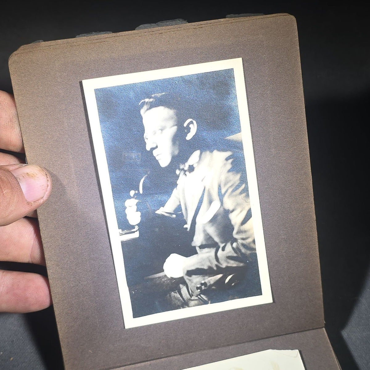 Antique Snapshot Photo Album Containing 45+ Snapshot Photographs, German-Captioned Transatlantic Voyage Aboard the R.M.S. Majestic with New York City Street Scenes, Shipboard Costume Party, Dining Room Interior, and Portraits