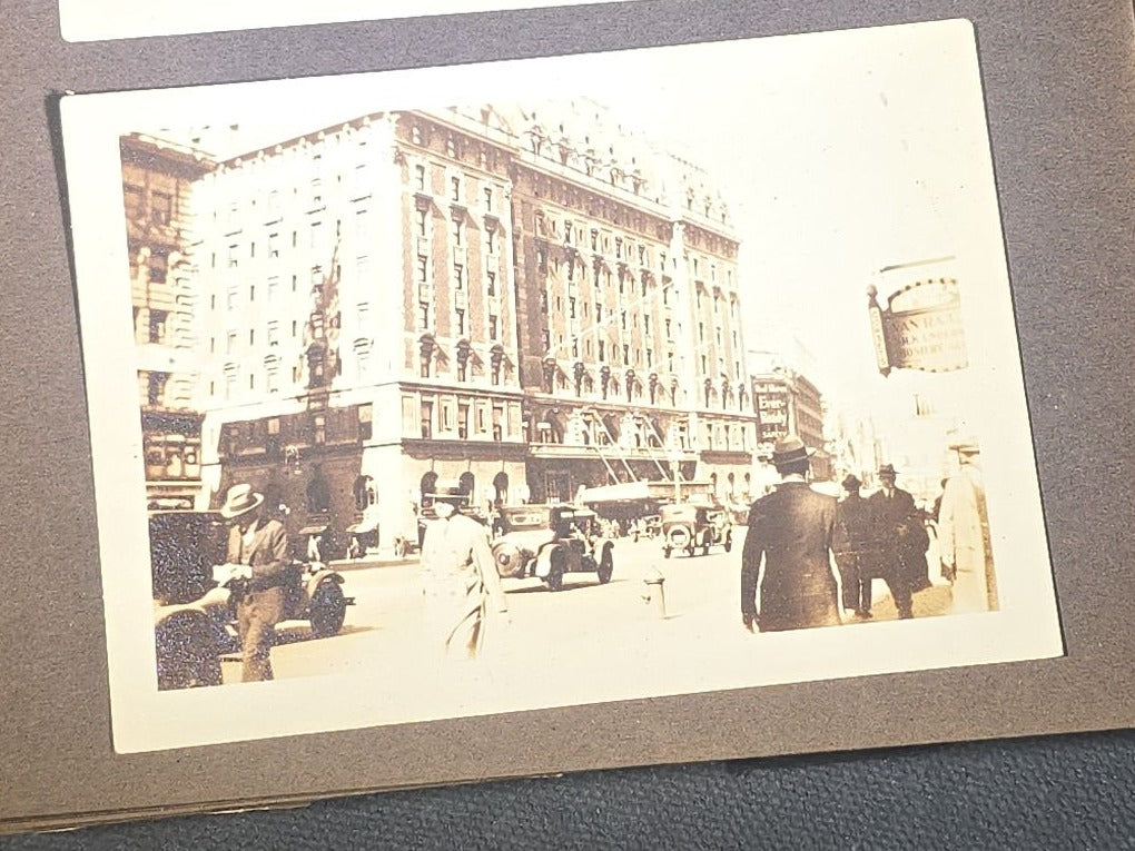 Antique Snapshot Photo Album Containing 45+ Snapshot Photographs, German-Captioned Transatlantic Voyage Aboard the R.M.S. Majestic with New York City Street Scenes, Shipboard Costume Party, Dining Room Interior, and Portraits