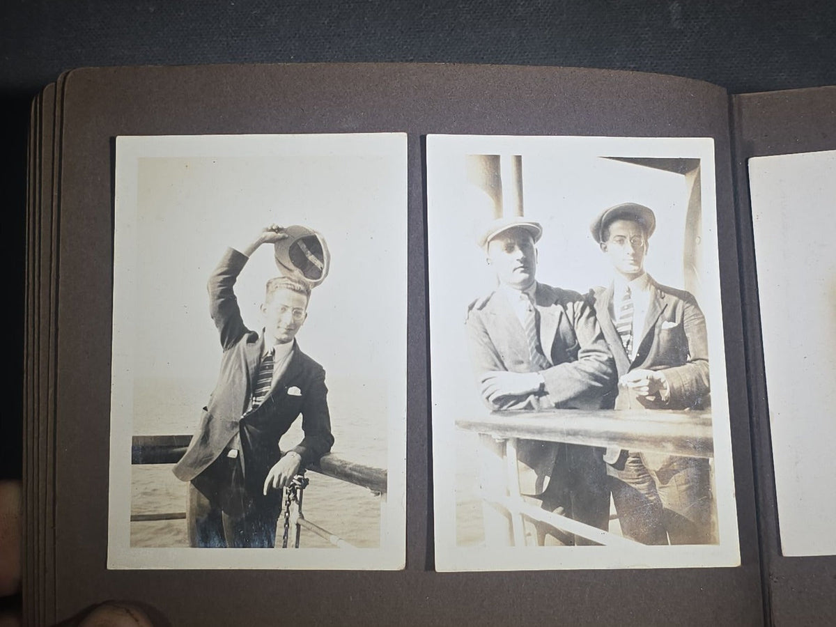 Antique Snapshot Photo Album Containing 45+ Snapshot Photographs, German-Captioned Transatlantic Voyage Aboard the R.M.S. Majestic with New York City Street Scenes, Shipboard Costume Party, Dining Room Interior, and Portraits
