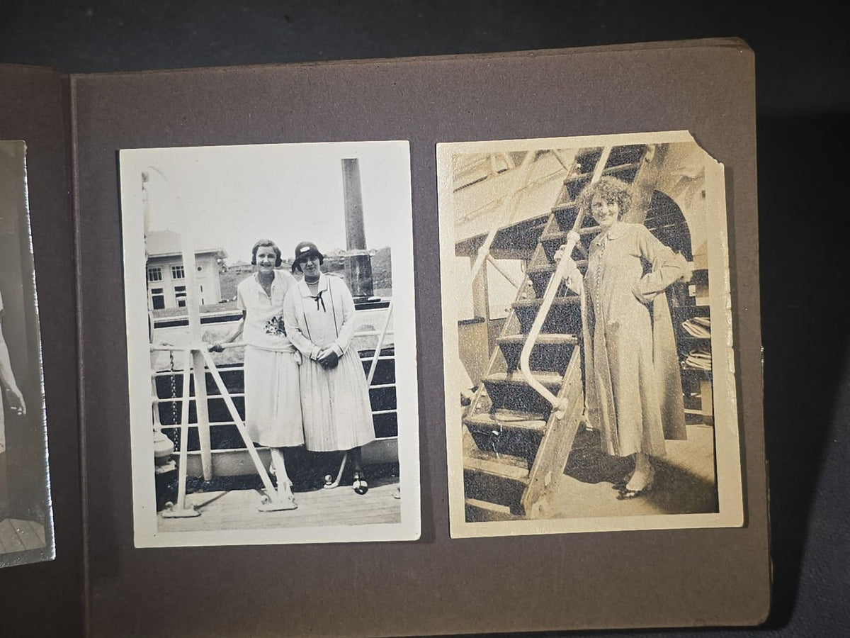 Antique Snapshot Photo Album Containing 45+ Snapshot Photographs, German-Captioned Transatlantic Voyage Aboard the R.M.S. Majestic with New York City Street Scenes, Shipboard Costume Party, Dining Room Interior, and Portraits