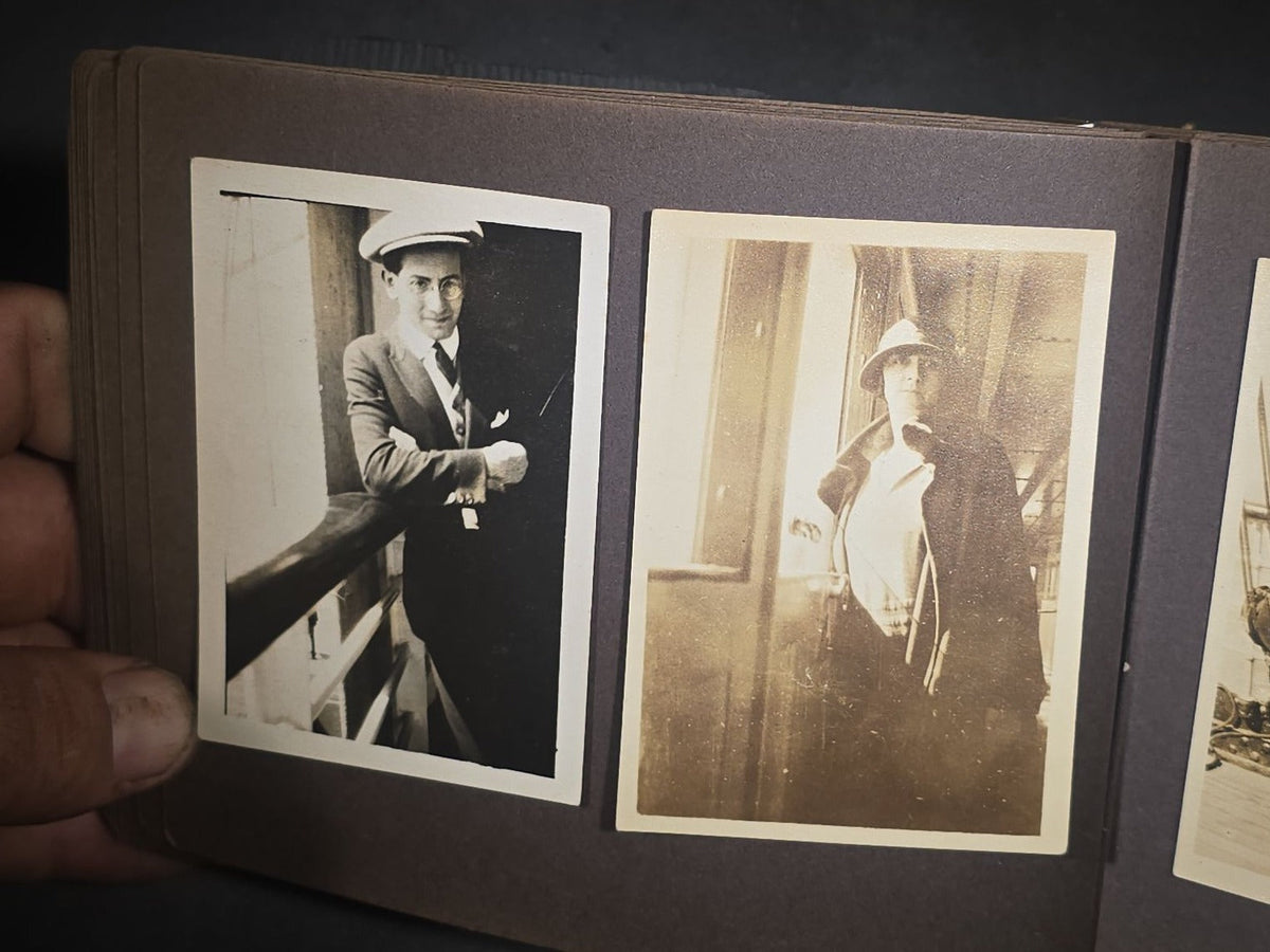 Antique Snapshot Photo Album Containing 45+ Snapshot Photographs, German-Captioned Transatlantic Voyage Aboard the R.M.S. Majestic with New York City Street Scenes, Shipboard Costume Party, Dining Room Interior, and Portraits