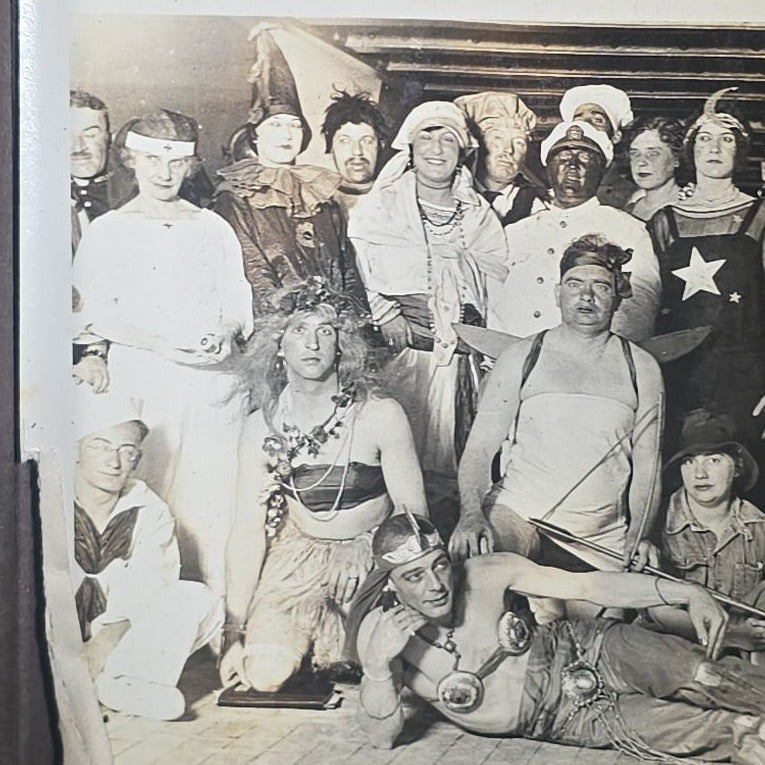 Antique Snapshot Photo Album Containing 45+ Snapshot Photographs, German-Captioned Transatlantic Voyage Aboard the R.M.S. Majestic with New York City Street Scenes, Shipboard Costume Party, Dining Room Interior, and Portraits