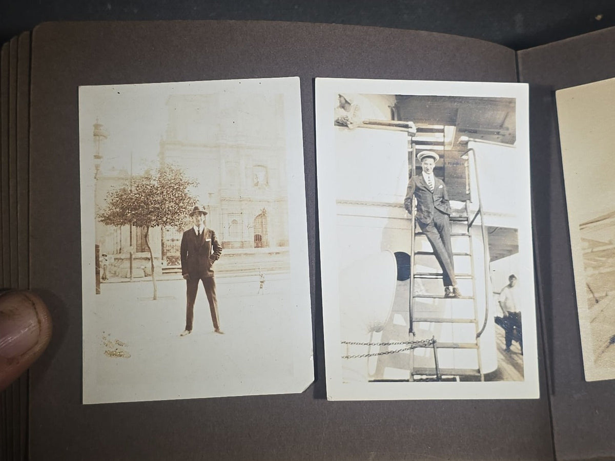 Antique Snapshot Photo Album Containing 45+ Snapshot Photographs, German-Captioned Transatlantic Voyage Aboard the R.M.S. Majestic with New York City Street Scenes, Shipboard Costume Party, Dining Room Interior, and Portraits