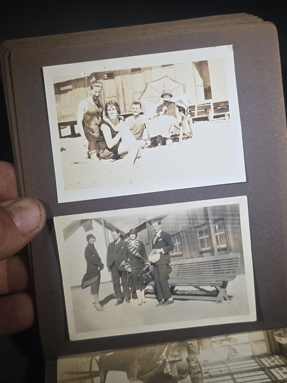 Antique Snapshot Photo Album Containing 45+ Snapshot Photographs, German-Captioned Transatlantic Voyage Aboard the R.M.S. Majestic with New York City Street Scenes, Shipboard Costume Party, Dining Room Interior, and Portraits
