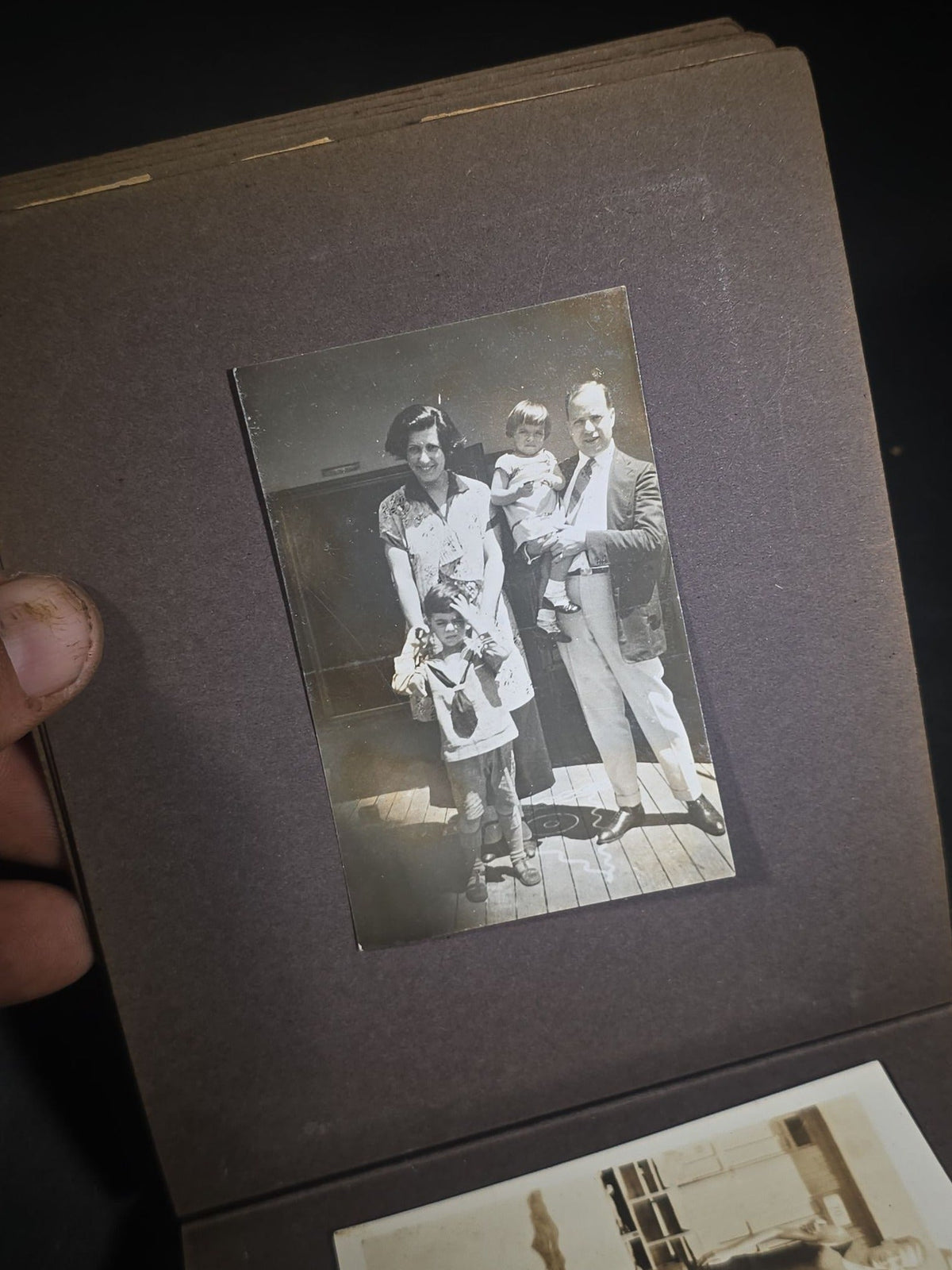 Antique Snapshot Photo Album Containing 45+ Snapshot Photographs, German-Captioned Transatlantic Voyage Aboard the R.M.S. Majestic with New York City Street Scenes, Shipboard Costume Party, Dining Room Interior, and Portraits