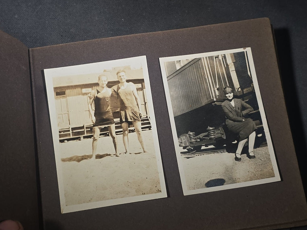 Antique Snapshot Photo Album Containing 45+ Snapshot Photographs, German-Captioned Transatlantic Voyage Aboard the R.M.S. Majestic with New York City Street Scenes, Shipboard Costume Party, Dining Room Interior, and Portraits