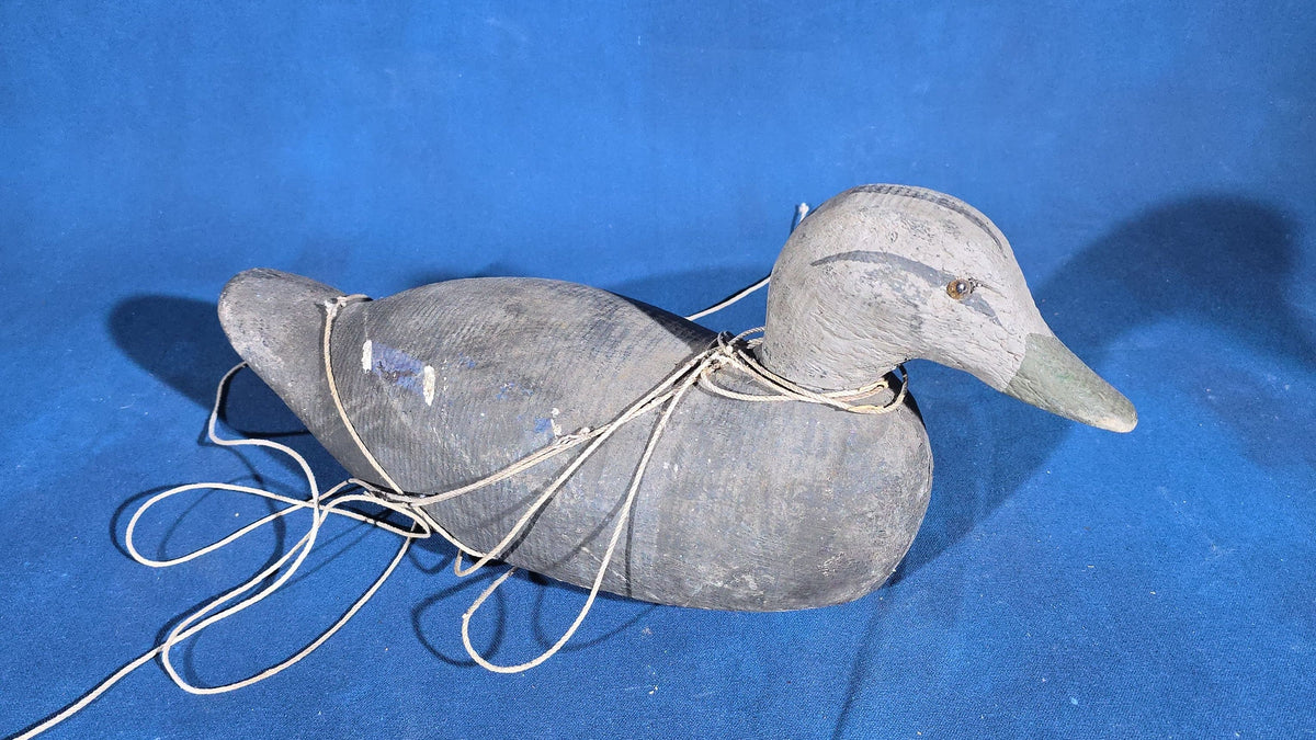 Trio of Antique Hand-Carved and Hand-Painted Wooden Duck Decoys with Glass Eyes and Rigging Lines
