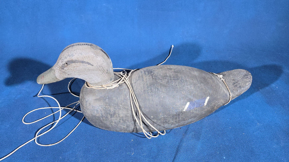 Trio of Antique Hand-Carved and Hand-Painted Wooden Duck Decoys with Glass Eyes and Rigging Lines