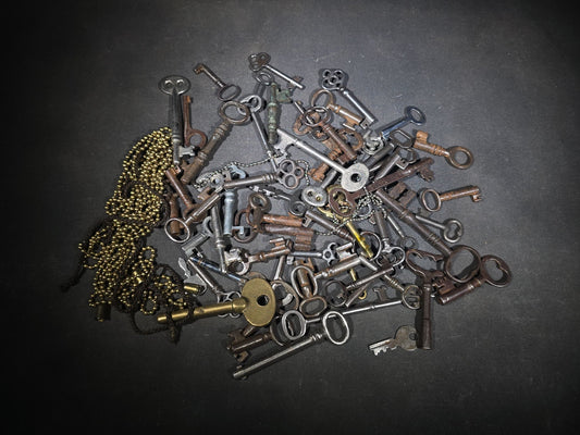 Grouping of 50+ Antique and Vintage Skeleton Keys including Barrel Keys, Cabinet Keys, and Padlock Keys