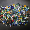 Lot 061 - Grouping of 200+ Antique and Vintage Glass and Clay Marbles in Assorted Types and Sizes Including Handmade German Swirls, Cat's Eyes, and UV-Fluorescent Examples