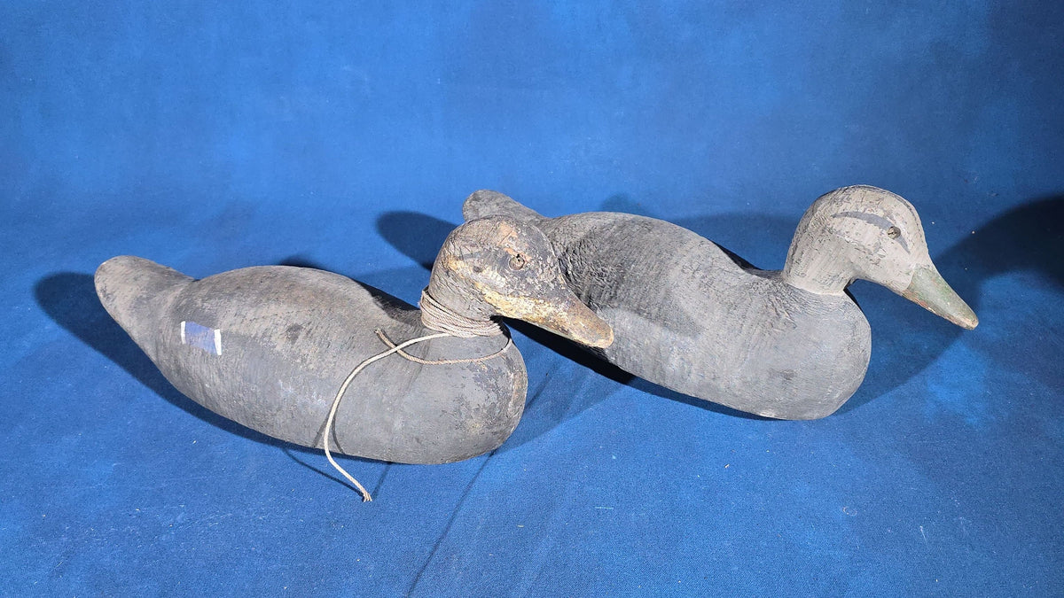 Pair of Antique Hand-Carved and Hand-Painted Duck Decoys with Glass Eyes