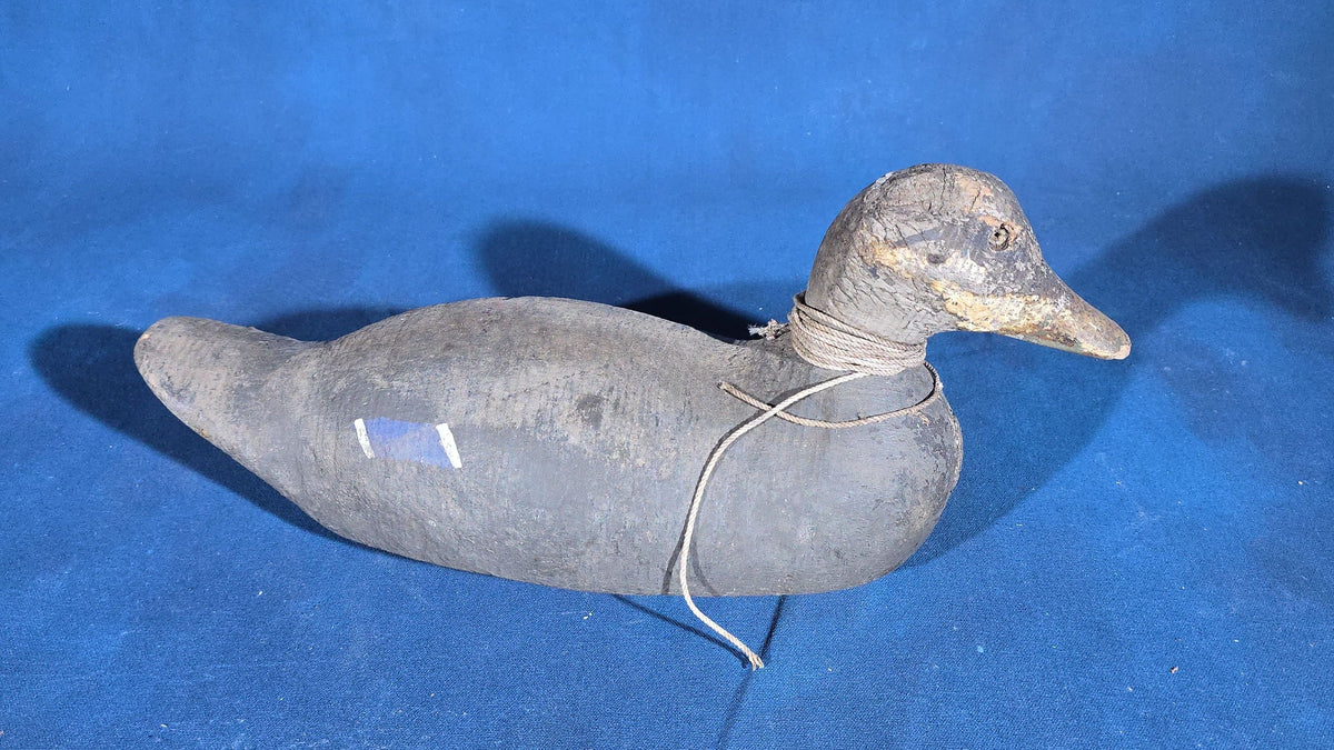Pair of Antique Hand-Carved and Hand-Painted Duck Decoys with Glass Eyes