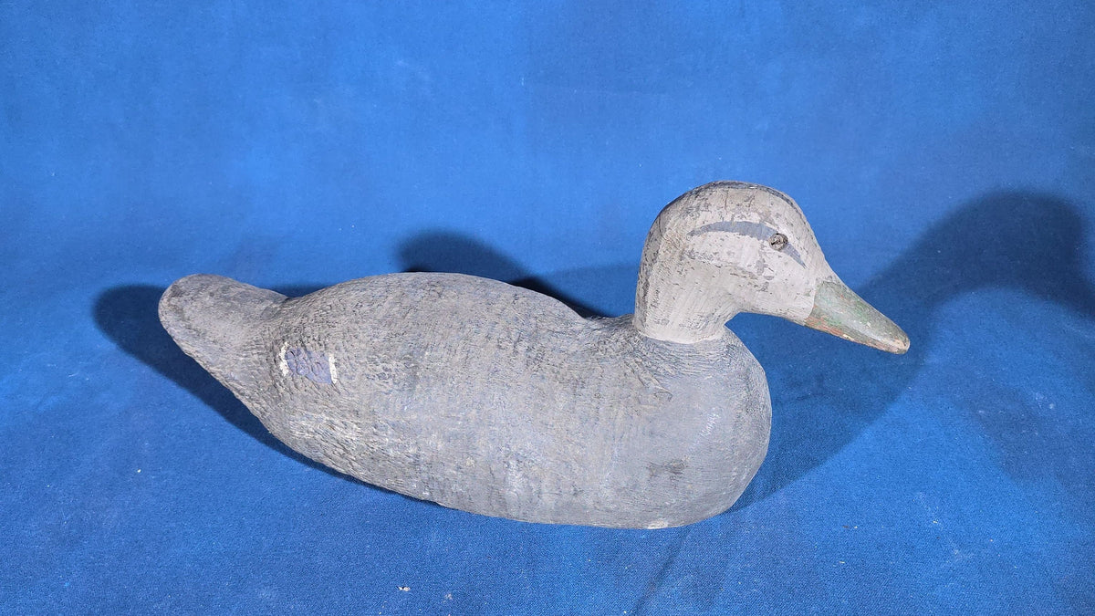 Pair of Antique Hand-Carved and Hand-Painted Duck Decoys with Glass Eyes