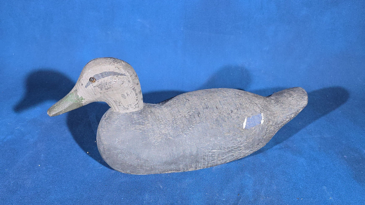 Pair of Antique Hand-Carved and Hand-Painted Duck Decoys with Glass Eyes