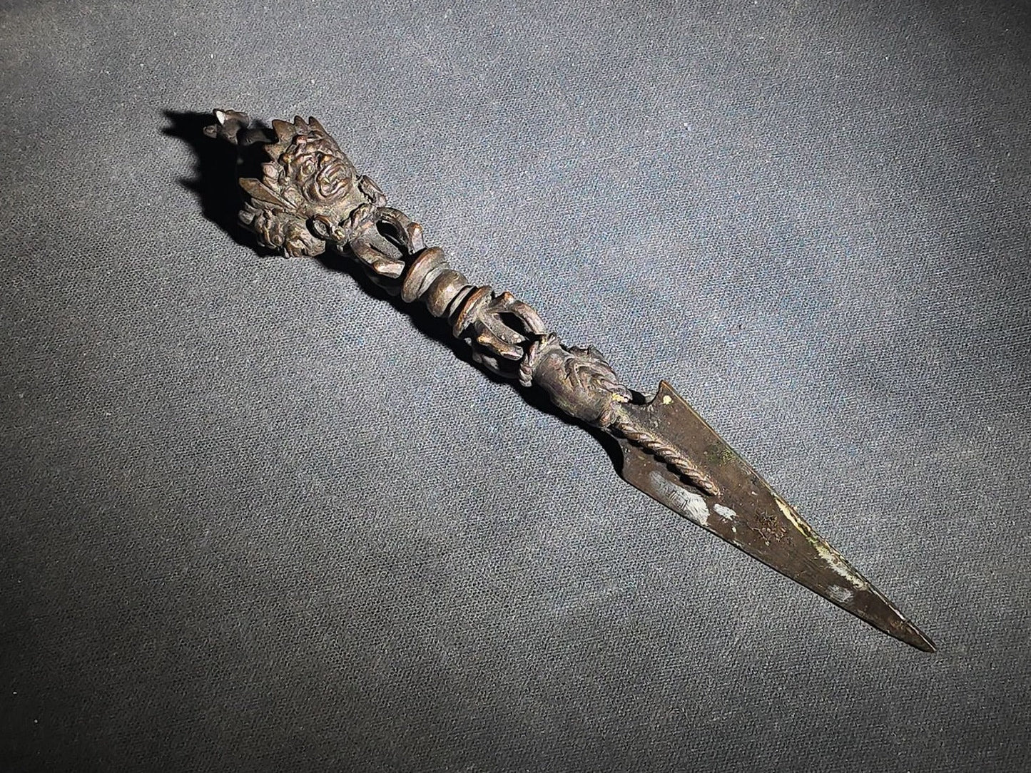 Antique Tibetan Bronze Phurba Ceremonial Ritual Dagger with Wrathful Deity Head and Triangular Blade