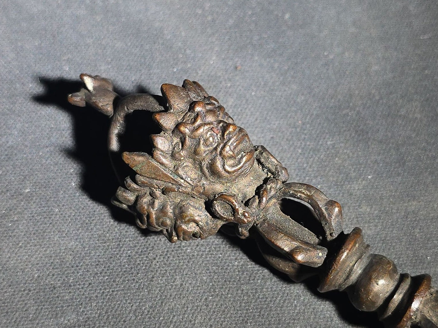 Antique Tibetan Bronze Phurba Ceremonial Ritual Dagger with Wrathful Deity Head and Triangular Blade
