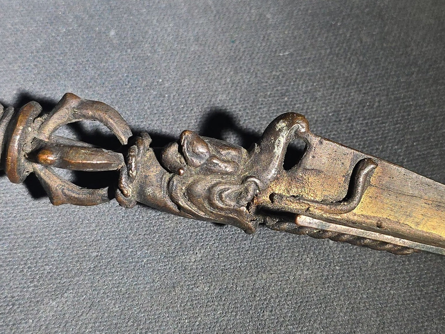 Antique Tibetan Bronze Phurba Ceremonial Ritual Dagger with Wrathful Deity Head and Triangular Blade