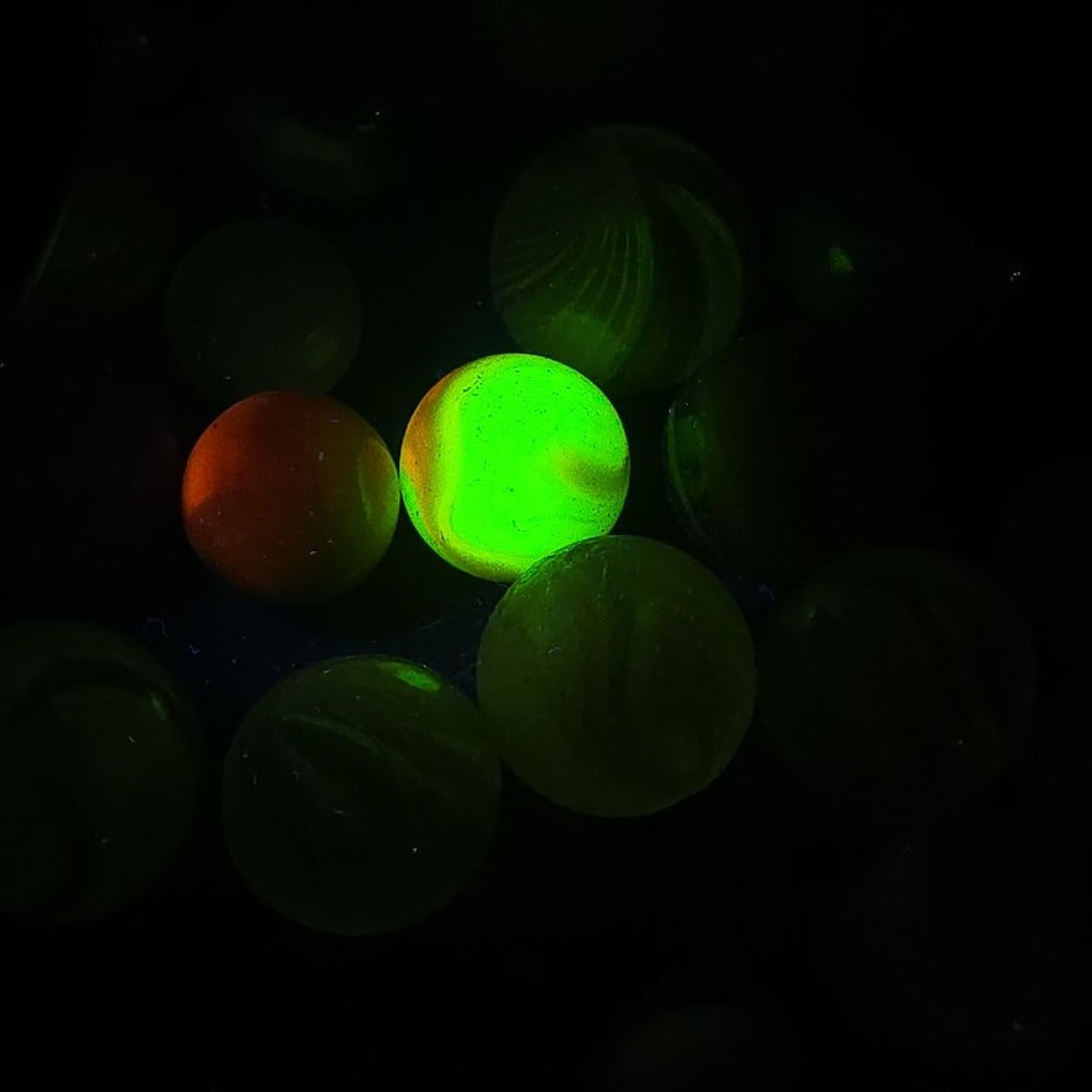 Grouping of 65+ Antique and Vintage Glass Marbles including Handmade German Swirls, Sulphide with Animal Figure, China, Clay, and UV-Reactive Glowing Examples