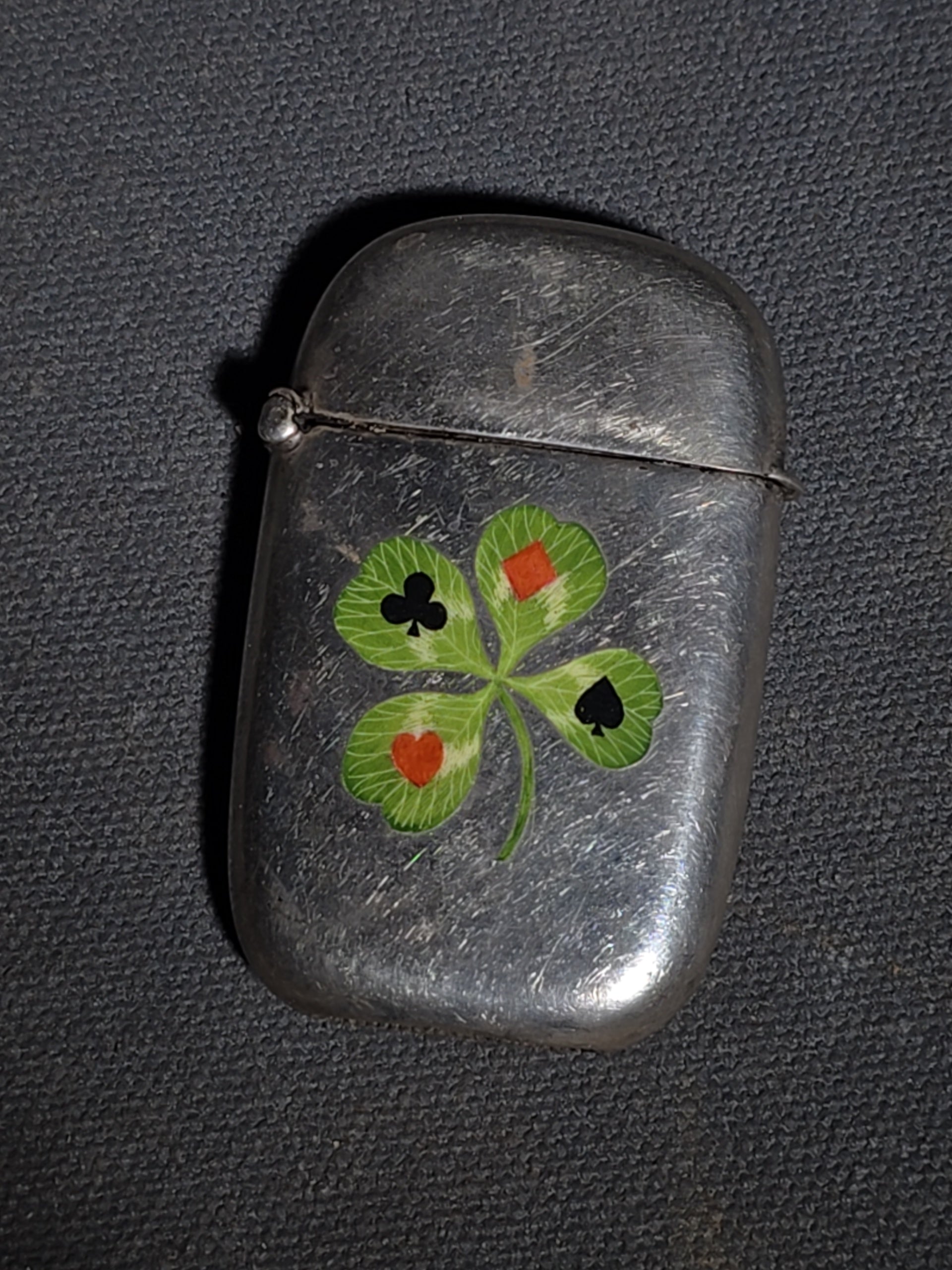 Pair of Antique Sterling Silver Match Safes including Art Nouveau Floral Example and Enameled Four-Leaf Clover with Card Suit Symbols