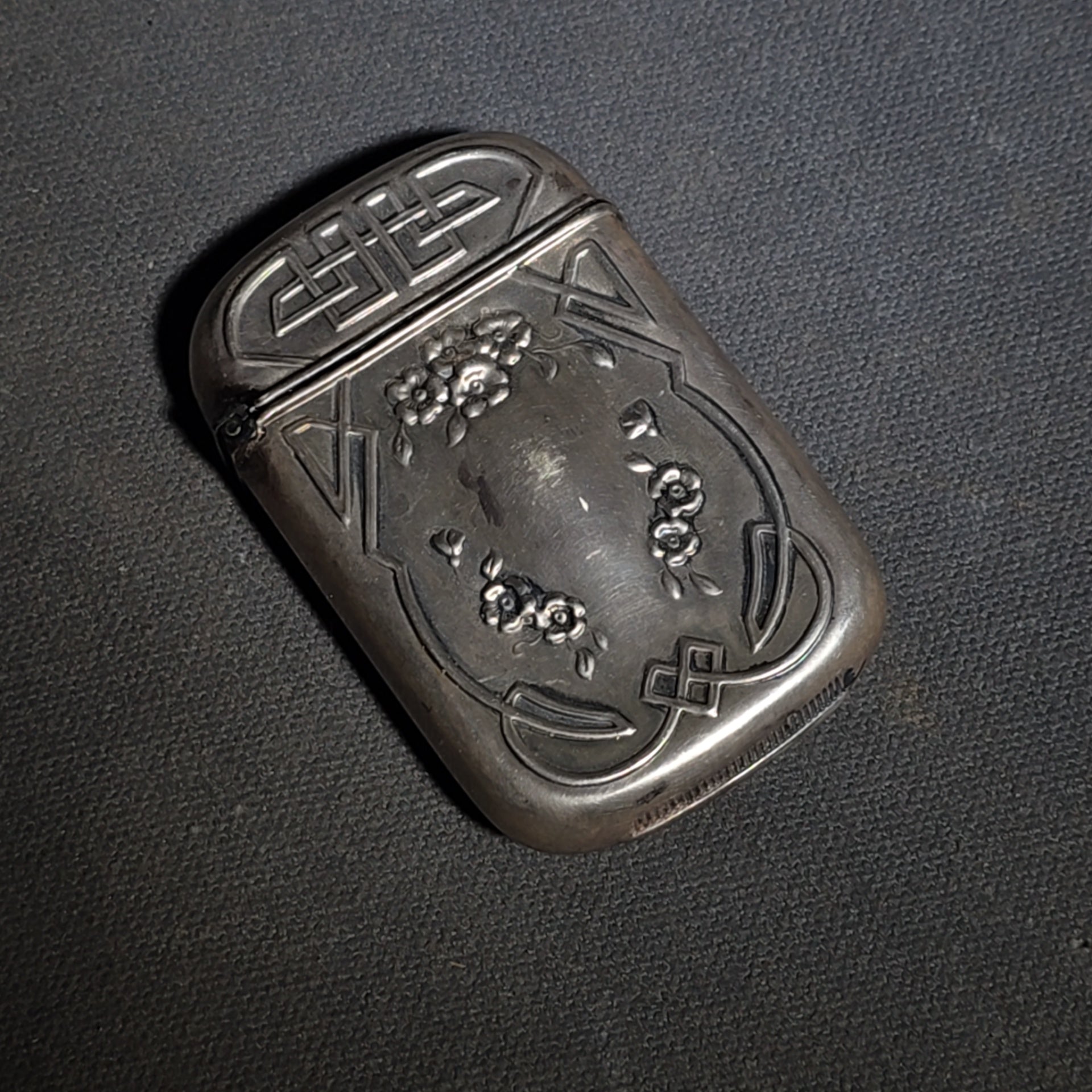 Pair of Antique Sterling Silver Match Safes including Art Nouveau Floral Example and Enameled Four-Leaf Clover with Card Suit Symbols
