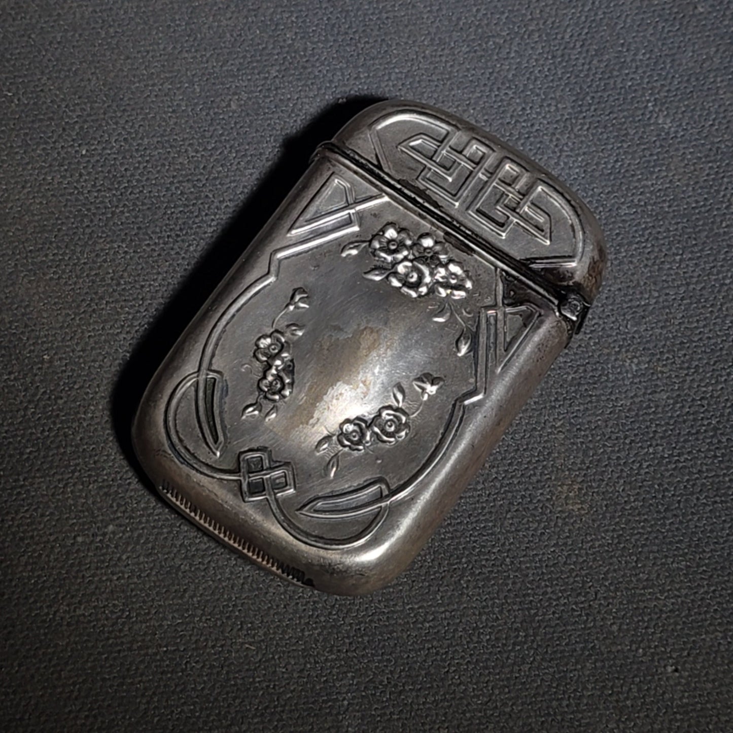 Pair of Antique Sterling Silver Match Safes including Art Nouveau Floral Example and Enameled Four-Leaf Clover with Card Suit Symbols