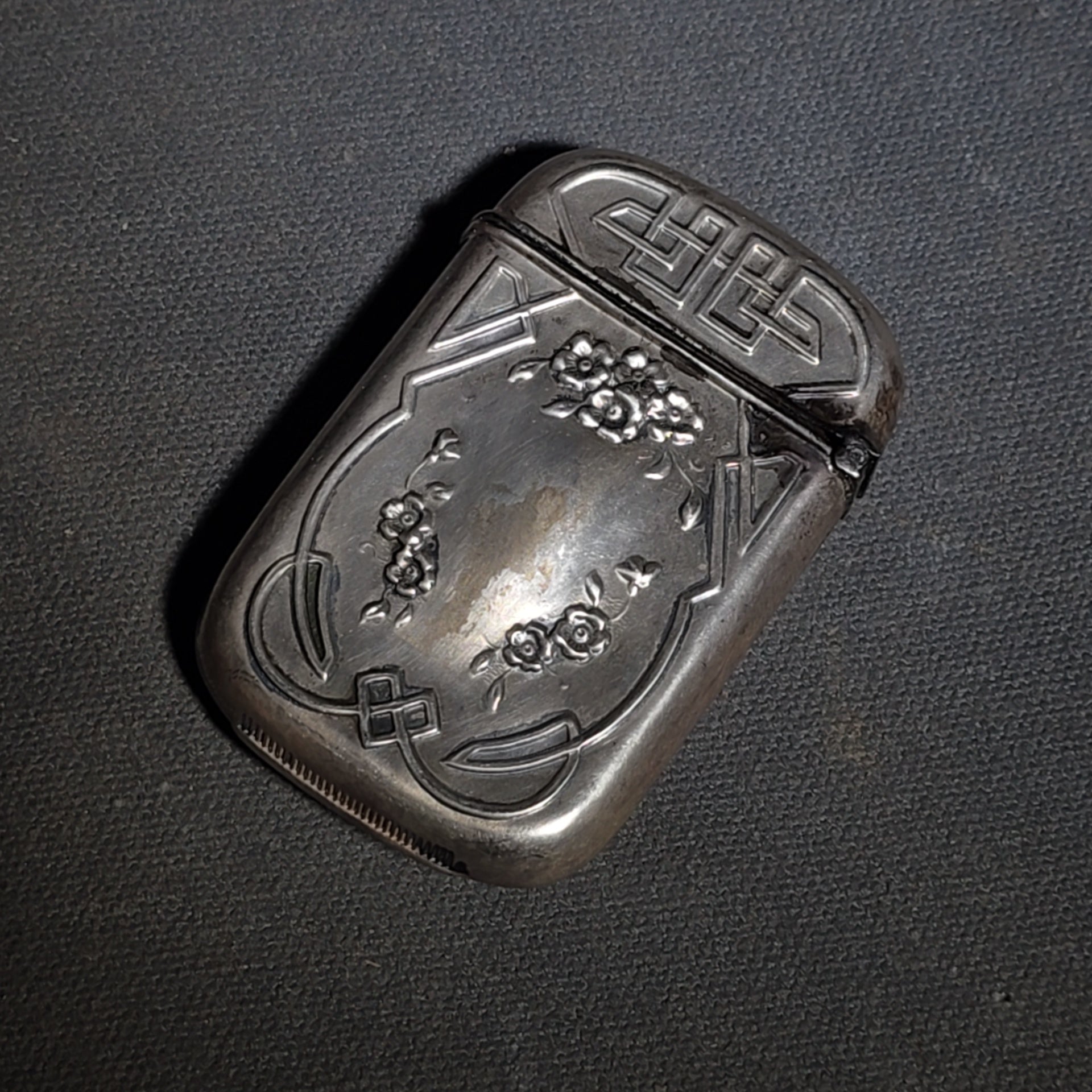 Pair of Antique Sterling Silver Match Safes including Art Nouveau Floral Example and Enameled Four-Leaf Clover with Card Suit Symbols