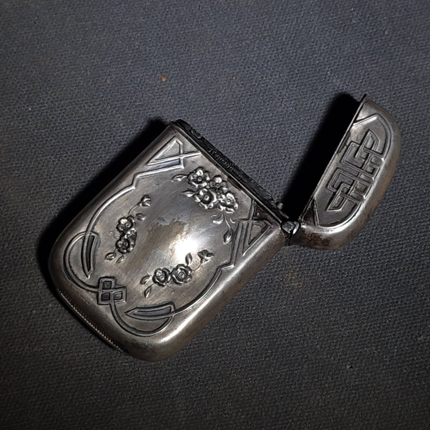 Pair of Antique Sterling Silver Match Safes including Art Nouveau Floral Example and Enameled Four-Leaf Clover with Card Suit Symbols