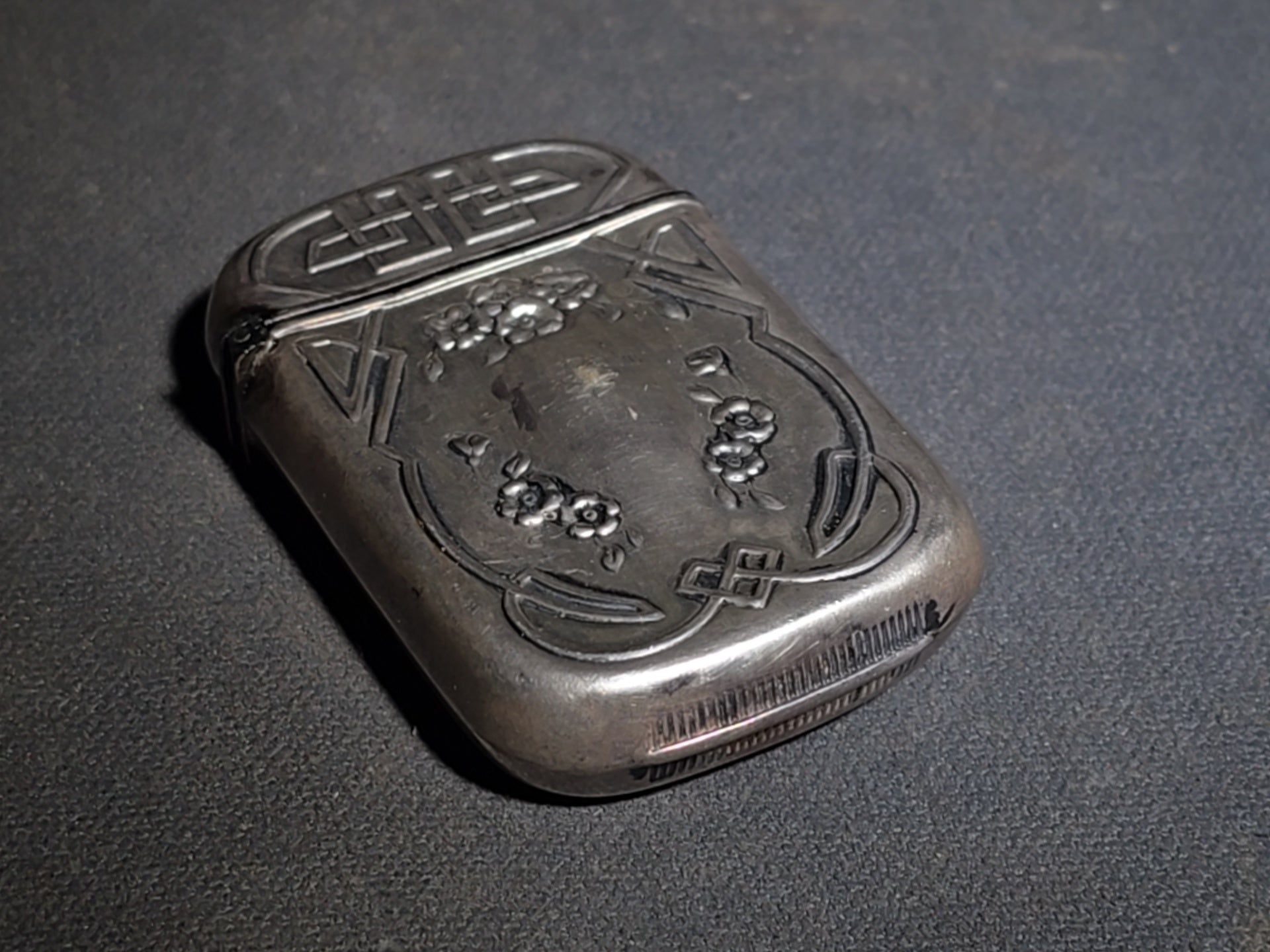 Pair of Antique Sterling Silver Match Safes including Art Nouveau Floral Example and Enameled Four-Leaf Clover with Card Suit Symbols
