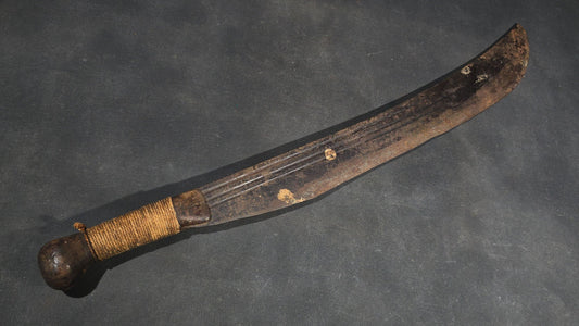 antique Machete with Curved Blade, Cord-Wrapped Handle, and Rounded Pommel