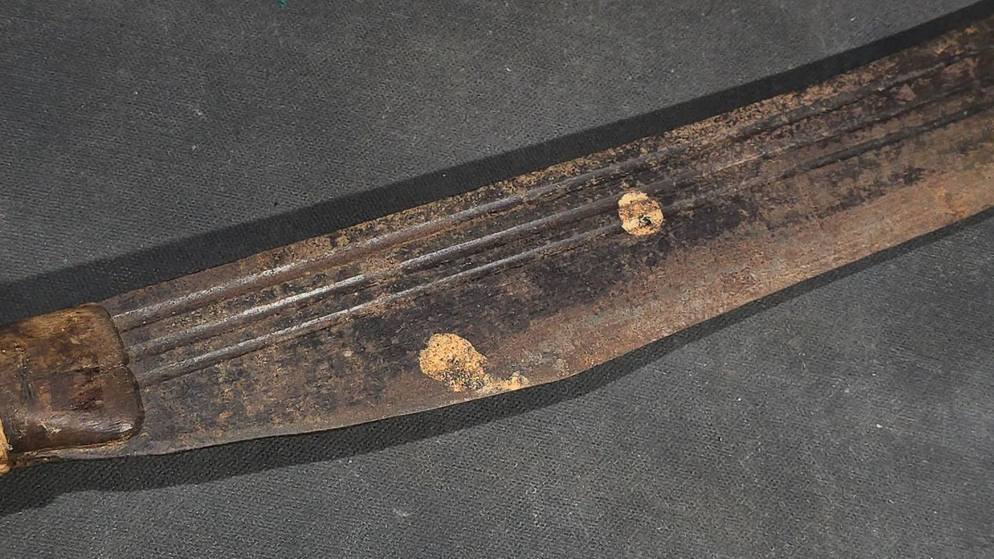 antique Machete with Curved Blade, Cord-Wrapped Handle, and Rounded Pommel