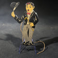 Lot 134 - Antique Tin Lithograph Charlie Chaplin "The Tramp" Figural String-Operated Toy with Hat-Tipping Action, Made in England, 4-1/4" H