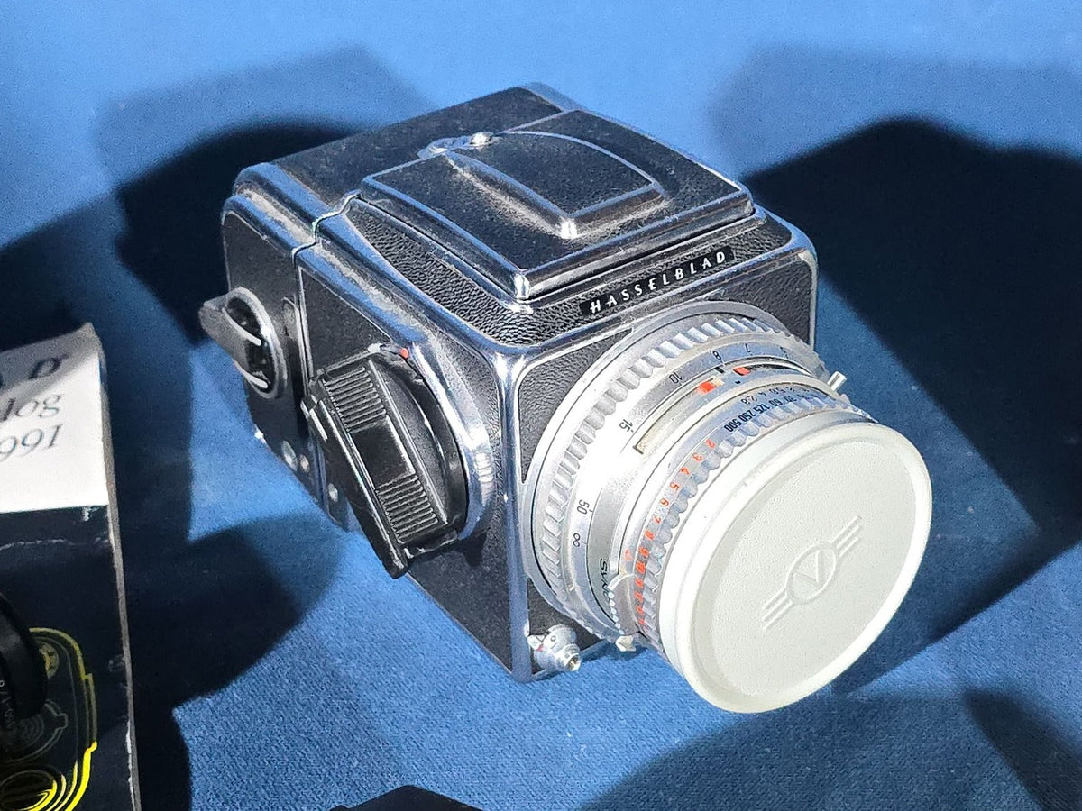 Vintage Hasselblad 500C/M Medium Format Camera with Carl Zeiss Planar 80mm and Distagon Lenses, Film Back, Prism Viewfinder, Extension Tube, and Accessories