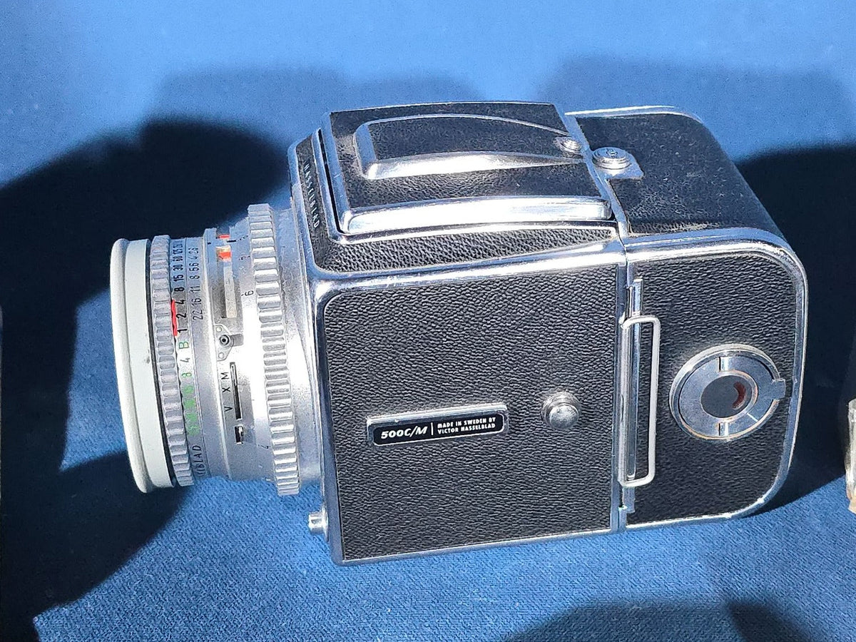 Vintage Hasselblad 500C/M Medium Format Camera with Carl Zeiss Planar 80mm and Distagon Lenses, Film Back, Prism Viewfinder, Extension Tube, and Accessories