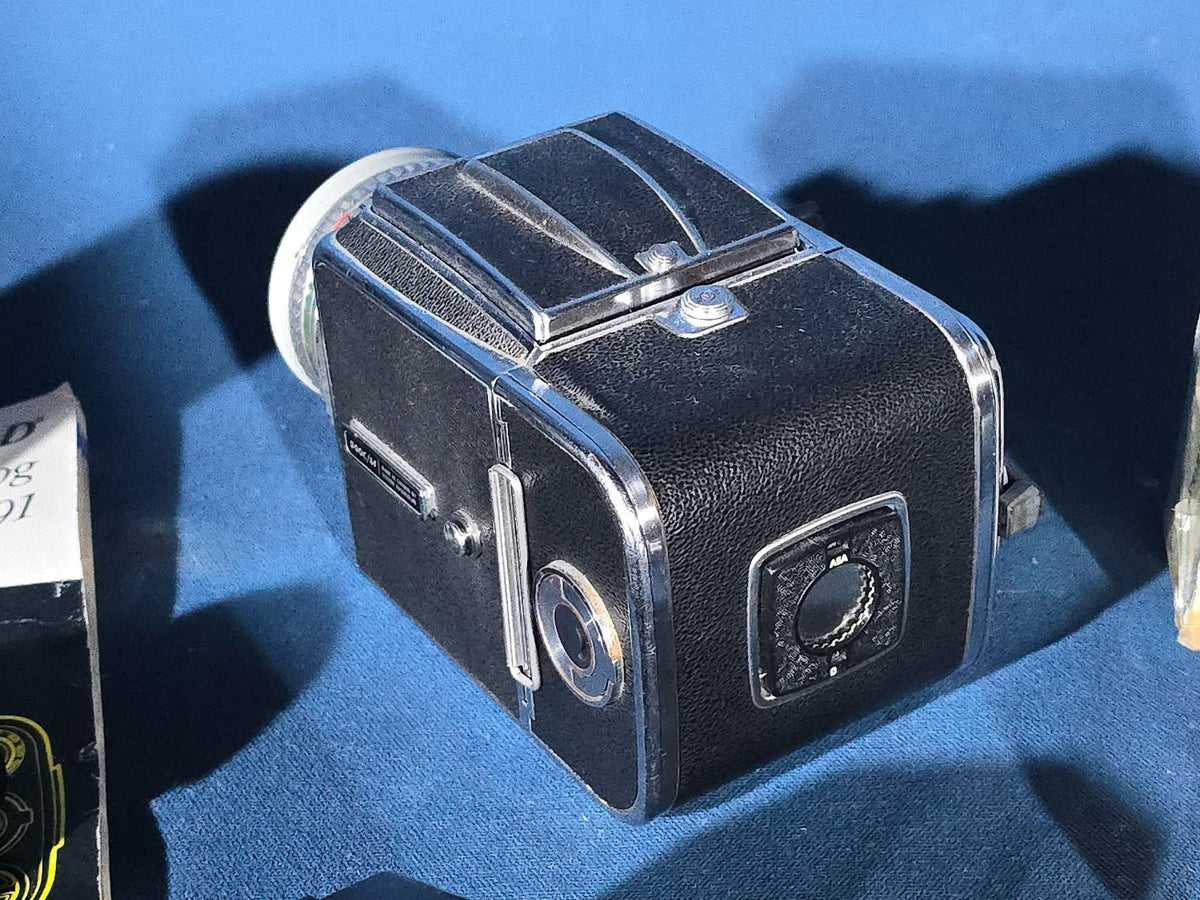 Vintage Hasselblad 500C/M Medium Format Camera with Carl Zeiss Planar 80mm and Distagon Lenses, Film Back, Prism Viewfinder, Extension Tube, and Accessories