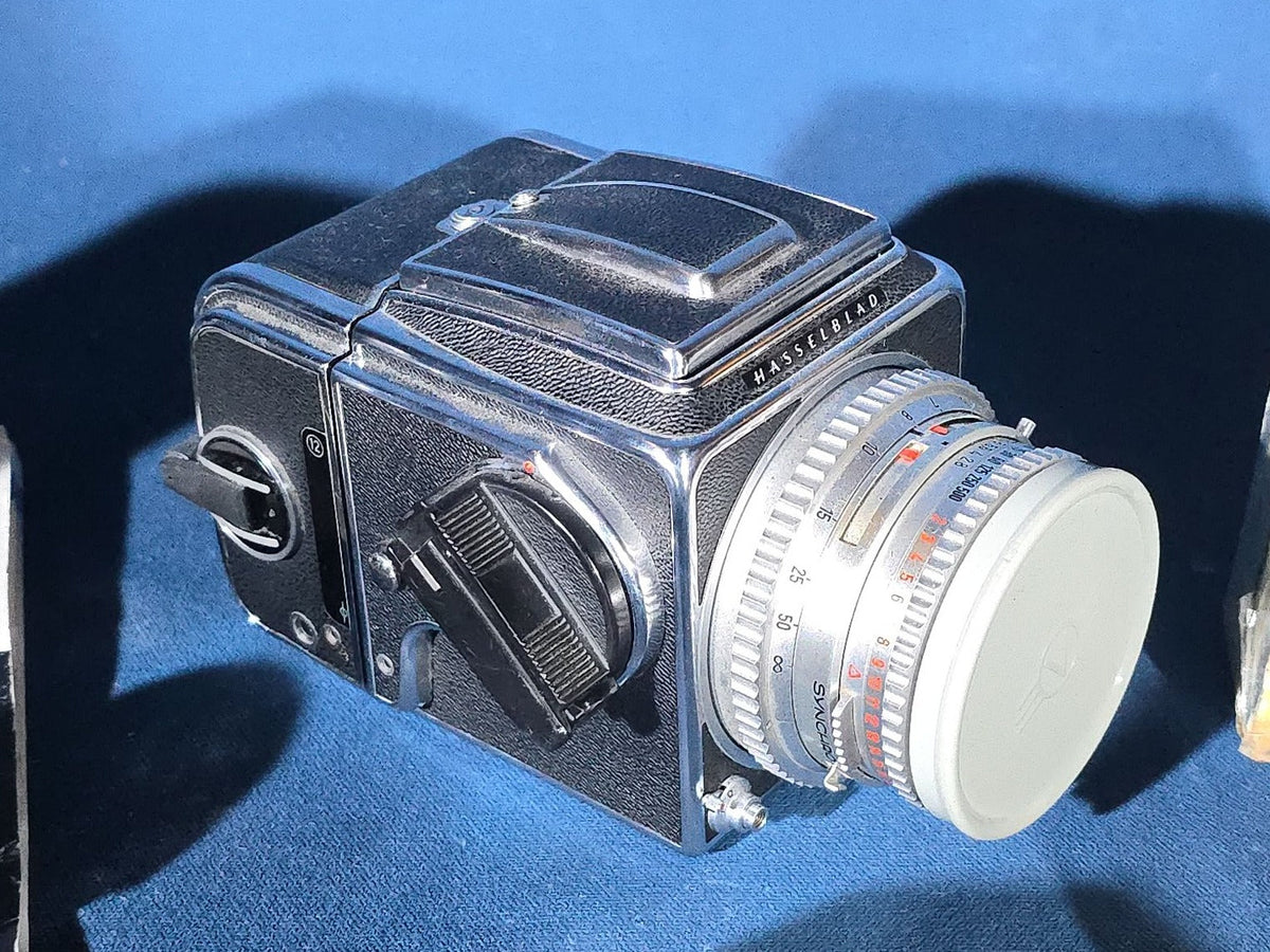 Vintage Hasselblad 500C/M Medium Format Camera with Carl Zeiss Planar 80mm and Distagon Lenses, Film Back, Prism Viewfinder, Extension Tube, and Accessories
