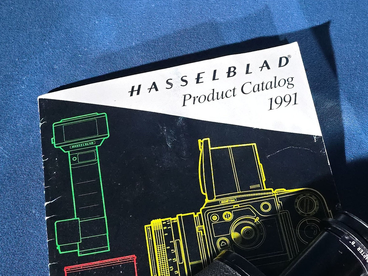 Vintage Hasselblad 500C/M Medium Format Camera with Carl Zeiss Planar 80mm and Distagon Lenses, Film Back, Prism Viewfinder, Extension Tube, and Accessories